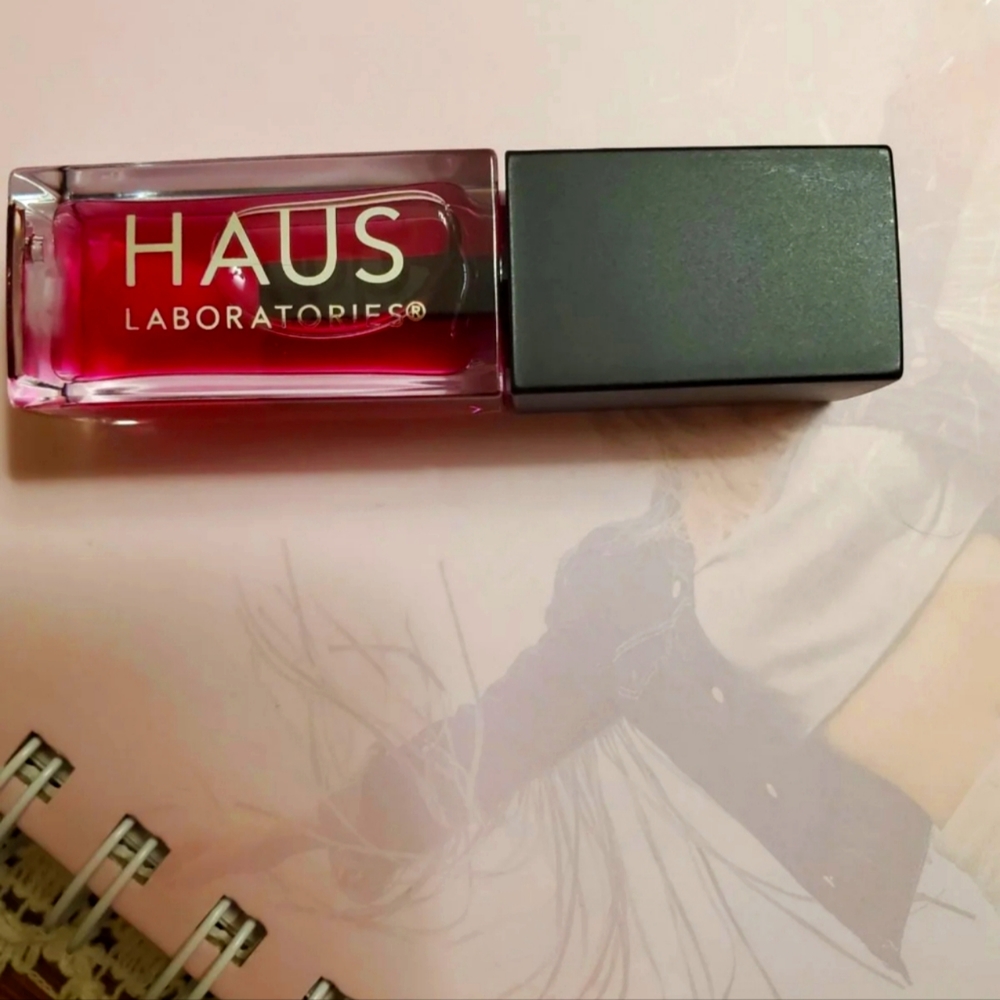 Lip oil shade is Tint. Haus Laboratories